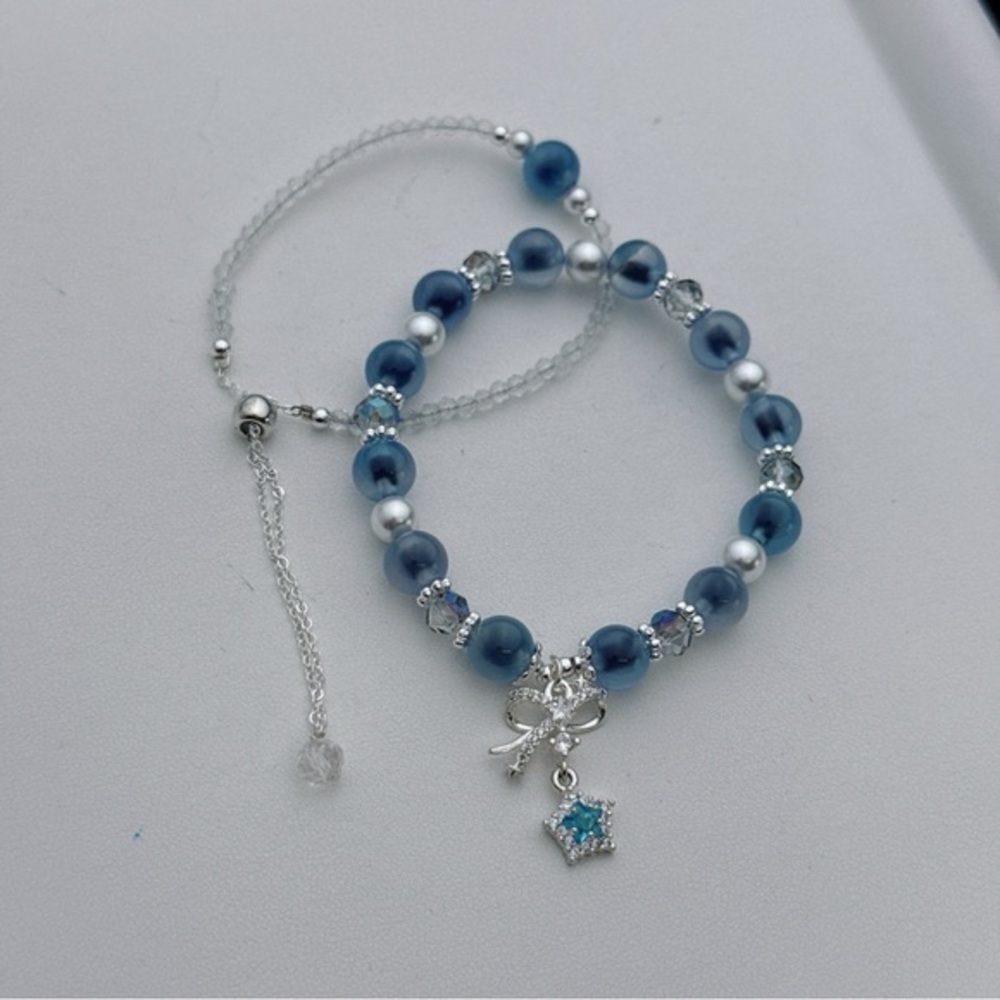 Elegant Blue and Silver Charm Bracelet